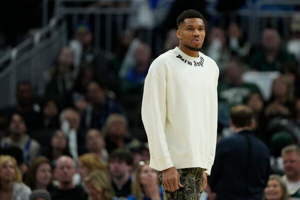 Milwaukee Bucks' Giannis Antetokounmpo looks on during the second half of an NBA basketball game against the Detroit Pistons, Sunday, April 13, 2025, in Milwaukee. (AP Photo/Aaron Gash)