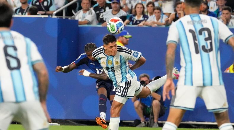 Cape Verde's Sidny Lopes Cabral (13) shoots and scores a goal past Argentina's Nahuel Molina (26) during the World Cup round of 32 soccer match between Argentina and Cape Verde in Miami Gardens, Fla., Friday, July 3, 2026. (AP Photo/Chris Carlson)