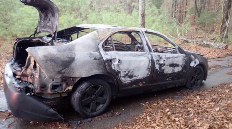 A car was found burned in the driveway of a vacant home in Auburn. The car had been reported stolen the same day.