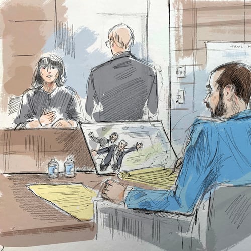 In this courtroom sketch, a witness describes video of an alleged attack on Salman Rushdie by Hadi Matar, in federal court in Buffalo, N.Y., Wednesday, July 22, 2026. Matar, foreground, is seated with his lawyer's co-council. (Alexandra Newbould via AP)