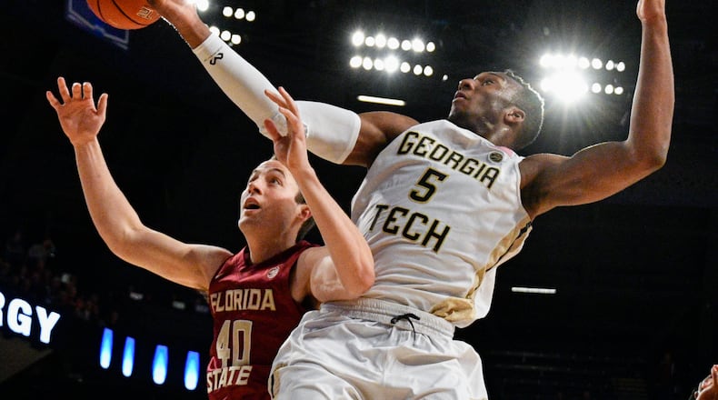 Florida State forward Brandon Allen (40) and Georgia Tech guard Josh Okogie (5) vie for a rebound during the second half of an NCAA basketball game Wednesday, Jan. 25, 2017, in Atlanta. Georgia Tech won 78-56. (AP Photo/John Amis)