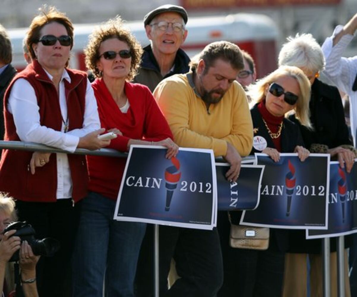 Herman Cain suspends presidential campaign