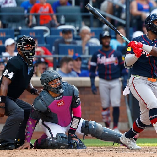 Atlanta Braves' Michael Harris II follows through on a home run during the eighth inning of a baseball game against the New York Mets, Saturday, June 13, 2026, in New York. (AP Photo/Noah K. Murray)