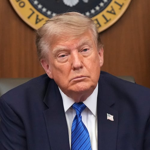 President Donald Trump listens during a cabinet meeting, Friday, July 31, 2026, at Camp David, the presidential retreat, near Thurmont, Md., Friday, July 31, 2026. (AP Photo/Jacquelyn Martin)