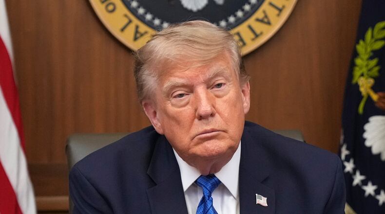President Donald Trump listens during a cabinet meeting, Friday, July 31, 2026, at Camp David, the presidential retreat, near Thurmont, Md., Friday, July 31, 2026. (AP Photo/Jacquelyn Martin)