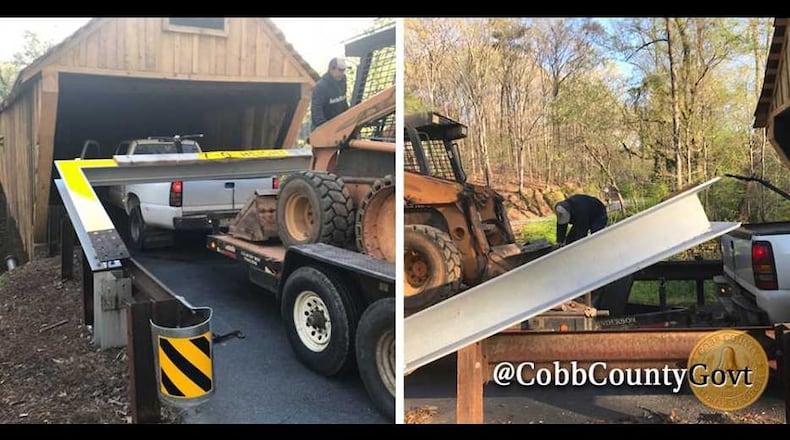 Someone hauling construction equipment hit the historic covered bridge in Cobb County again.