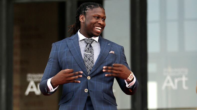 UCLA's Takkarist McKinley arrives for the first round of the 2017 NFL football draft, Thursday, April 27, 2017, in Philadelphia.