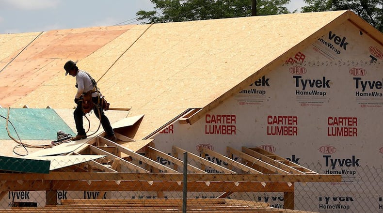 Cherokee County commissioners are opposing state legislation that would preempt local control over residential building design standards. CREDIT: Bill Lackey / Springfield News-Sun / AJC FILE