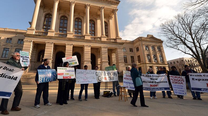 JANUARY 27, 2014 ATLANTA Protesters gather outside the Capitol Monday, January 27, 2014. Ten protesters, including State Sen Vincent Fort, were arrested in the Governor's Office shortly after 5pm Monday, January 27, 2014. Georgia's "Moral Mondays" organizers, hoping to turn up the heat on the issue of Medicaid expansion, are planning a "sit in" in the governor's office in an effort to get arrested. The "Moral Mondays" movement began in North Carolina and protests there resulted in many arrests. KENT D JOHNSON/KDJOHNSON@AJC.COM