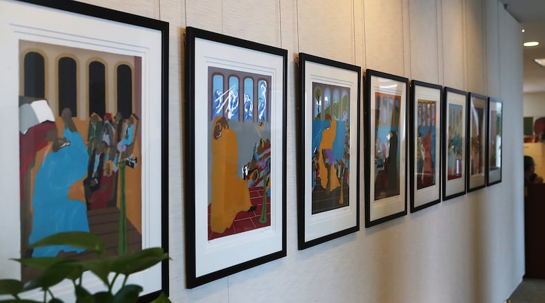 June 5, 2017, Atlanta: A 1989 series of serigraphic prints called “Eight Studies for The Book of Genesis” by Jacob Lawrence hang on a office wall at Atlanta Life Financial Group on Monday, June 5, 2017, in Atlanta. Curtis Compton/ccompton@ajc.com