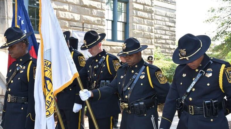 DeKalb Police Honor Guard pause for a moment of silence in a file photo.