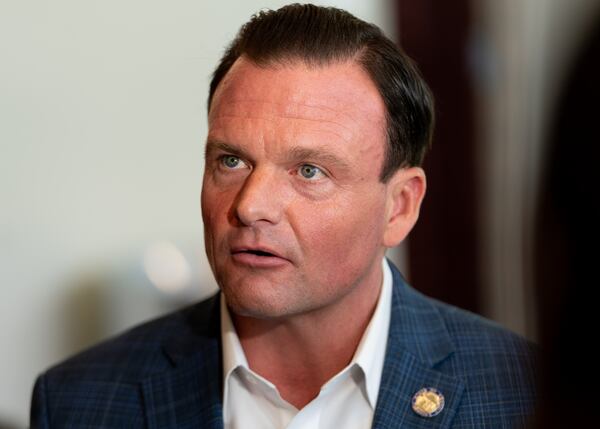 Georgia state Sen. Clint Dixon gives an interview during the proposed creation of Mulberry. The city was proposed to control zoning after a developer applied to build hundreds of apartments within an area that currently had no multi-family housing. (Ben Hendren for the AJC 2024)