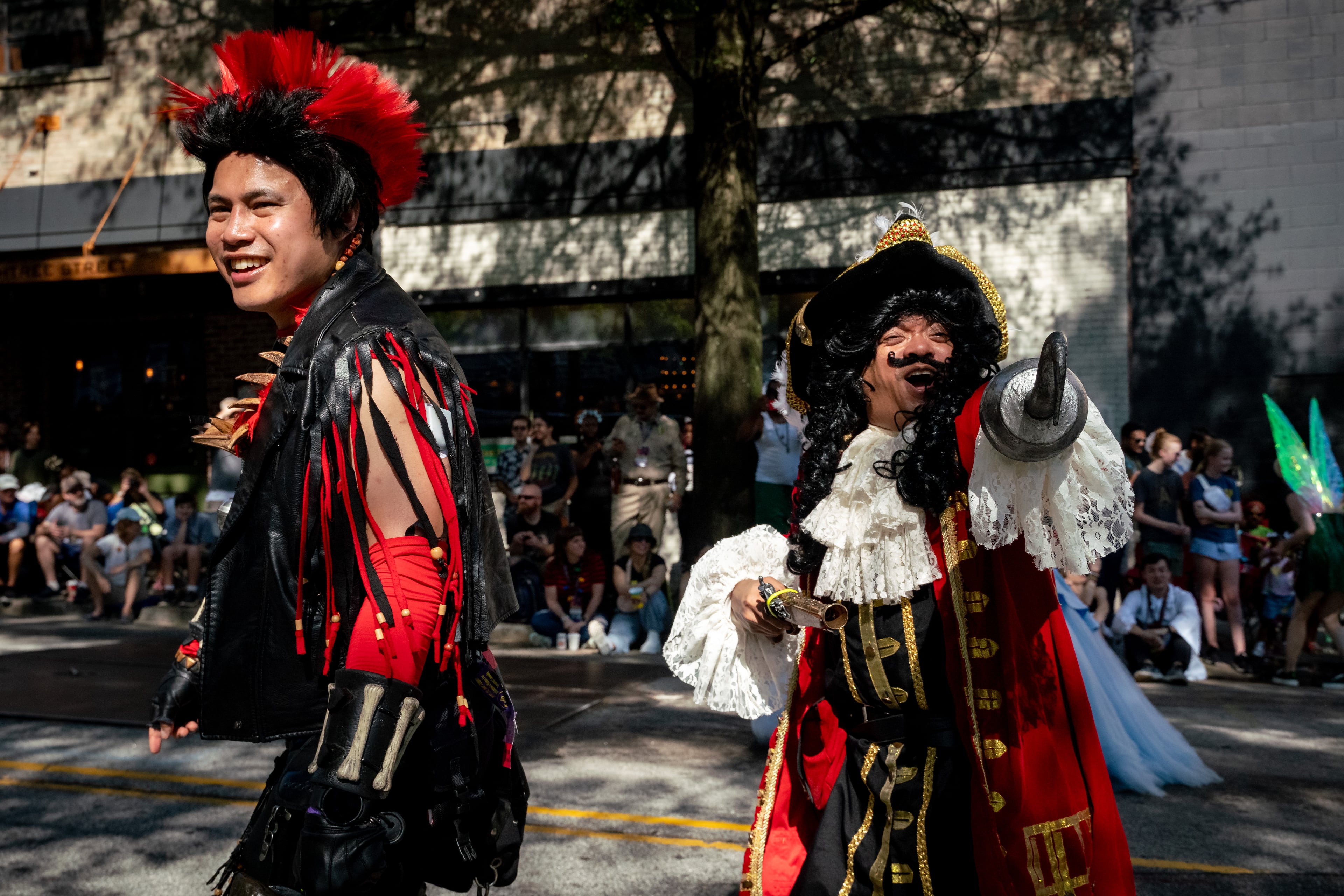 Thousands lined up along Peachtree Street on Saturday morning, August 31, 2024, for the annual Dragon Con parade in Atlanta. (Ben Hendren for The Atlanta Journal-Constitution)