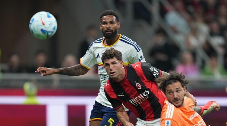 AC Milan's Christian Pulisic scores their opening goal during the Serie A soccer match between AC Milan and Lecce, in Milan, Italy, Sunday, Sept. 20, 2026. (AP Photo/Antonio Calanni)