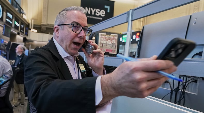 Options trader Joseph D'Arrigo works on the floor of the New York Stock Exchange, Tuesday, June 16, 2026. (AP Photo/Richard Drew)
