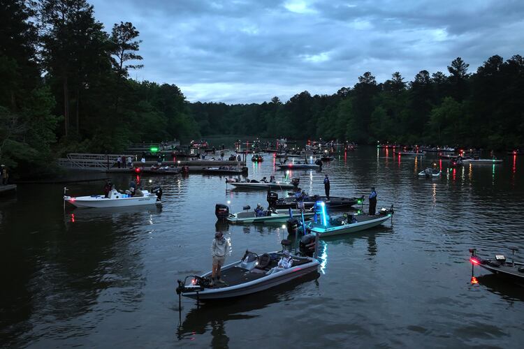 Contestants wait on the Lake Sinclair for the start of the GHSA State Bass Fishing Championship at Dennis Station Boat Ramp on Saturday, May 9, 2026, in Eatonton. The 2026 GHSA Bass Fishing State Championship at Lake Sinclair features a field of 113 boats. (Hyosub Shin/AJC)