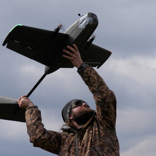 A student soldier of the Yatagan School for Unmanned Aerial Systems launches a training target drone during drills in the Kyiv region, Ukraine, Thursday, March 19, 2026. (AP Photo/Efrem Lukatsky)