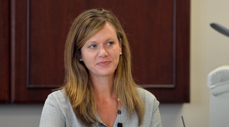 Ethics cases have languished under Georgia Government Transparency and Campaign Finance Commission executive secretary Holly LaBerge, pictured here at a commission meeting Aug. 19, 2014. BRANT SANDERLIN / BSANDERLIN@AJC.COM .