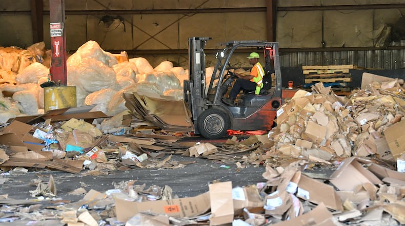 A worker operates a forklift to unload and sort cardboards at Sonoco Recycling Atlanta Facility. Celadon will build a new $155 million cardboard recycling and manufacturing facility in Chatham County. (Hyosub Shin / Hyosub.Shin@ajc.com)