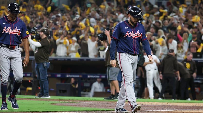 Atlanta Braves’ Travis d'Arnaud pops out to San Diego Padres catcher Kyle Higashioka to end National League Division Series Wild Card Game Two at Petco Park in San Diego on Wednesday, Oct. 2, 2024. Atlanta lost 5-4 allowing the Padres to advance to the Division Series and face the Los Angeles Dodgers. (Jason Getz / Jason.Getz@ajc.com)