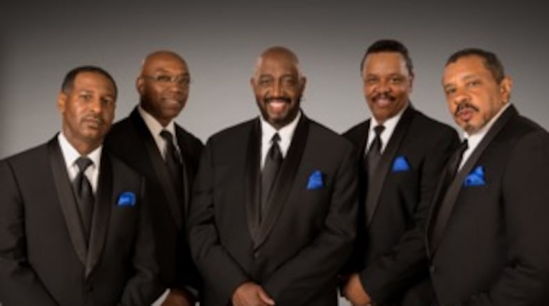 The Temptations is still anchored by original member Otis Williams (center).