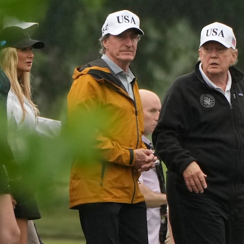 President Donald Trump, from right, and Interior Secretary Doug Burgum tour the East Potomac Park golf course, Sunday, June 28, 2026, in Washington. (AP Photo/Mark Schiefelbein)