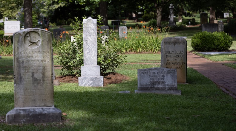 Newly restored headstones stand in Oakland Cemetery's African-American Burial of grounds Friday, June 10, 2022. The 3.5-acre area within Oakland Cemetery’s 48 acres has not undergone large-scale restoration in more than a century, but thousands of donors pitched in. (Steve Schaefer / steve.schaefer@ajc.com)