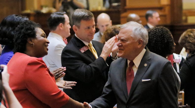 Gov. Nathan Deal is greeted by then-House Minority Leader Stacey Abrams, in this 2017 file photo. BOB ANDRES /BANDRES@AJC.COM