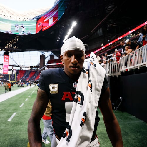 Atlanta Falcons quarterback Michael Penix Jr. (9) leaves the field after the game where the Carolina Panthers defeated the Atlanta Falcons in overtime 30-27, at Mercedes-Benz Stadium in Atlanta on Sunday, Nov. 16, 2025. (Miguel Martinez/ AJC)