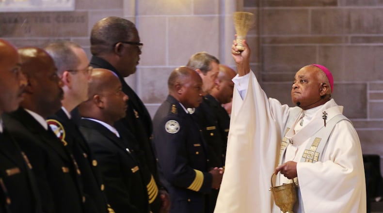 The Archdiocese of Atlanta held its "Blue Mass" for public safety officials and first responders in the archdiocese .The mass was concelebrated by the priests of the Archdiocese of Atlanta, with Archbishop Wilton Gregory as the chief celebrant, at the Cathedral of Christ the King. During the Sept. 11, 2001 terrorist attacks hundreds of first responders were killed. BOB ANDRES / BANDRES@AJC.COM