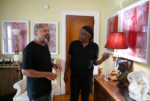Artist Carl Christian (left) has been a longtime collector of Styles' (right) abstract artworks. (Hyosub Shin/AJC)