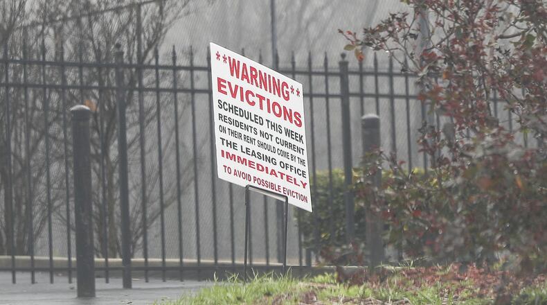 A warning of eviction sign is displayed in front of the leasing office at Parkview Apartments, located at 360 Riverside Parkway, in Austell, Thursday, February 21, 2019. ALYSSA POINTER/ALYSSA.POINTER@AJC.COM