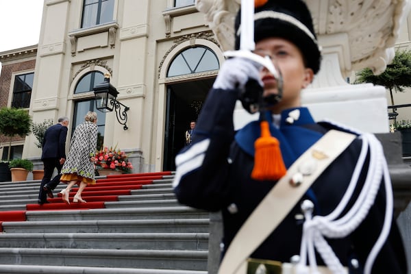 Canada's Prime Minister Mark Carney and his wife Diana, left, arrive at the Paleis Huis ten Bosch ahead of a dinner on the sidelines of the NATO summit in The Hague, Netherlands, Tuesday, June 24, 2025. (Remko de Waal, Pool Photo via AP)
