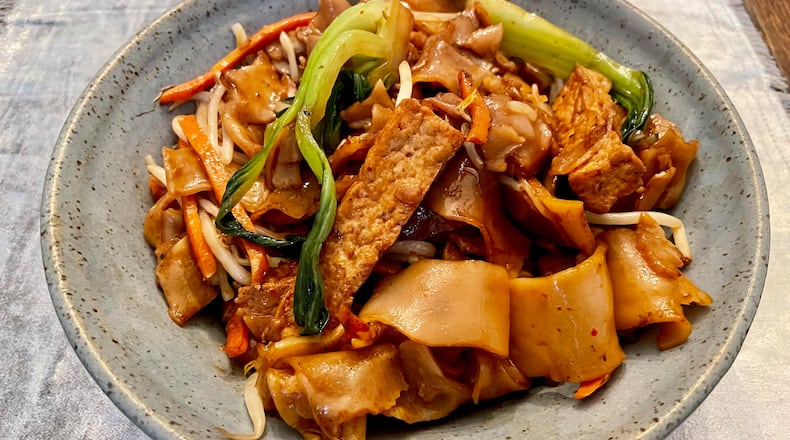 Chow kway teow at Mamak Vegan Kitchen includes rice noodles, carrots, bok choy, tofu and bean sprouts. Angela Hansberger for The Atlanta Journal-Constitution