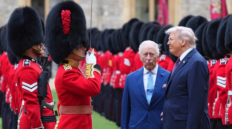 FILE - President Donald Trump and Britain's King Charles III review the Guard of Honour after the arrival at Windsor Castle in Windsor, England, Wednesday, Sept. 17, 2025.(AP Photo/Kirsty Wigglesworth, Pool, File)