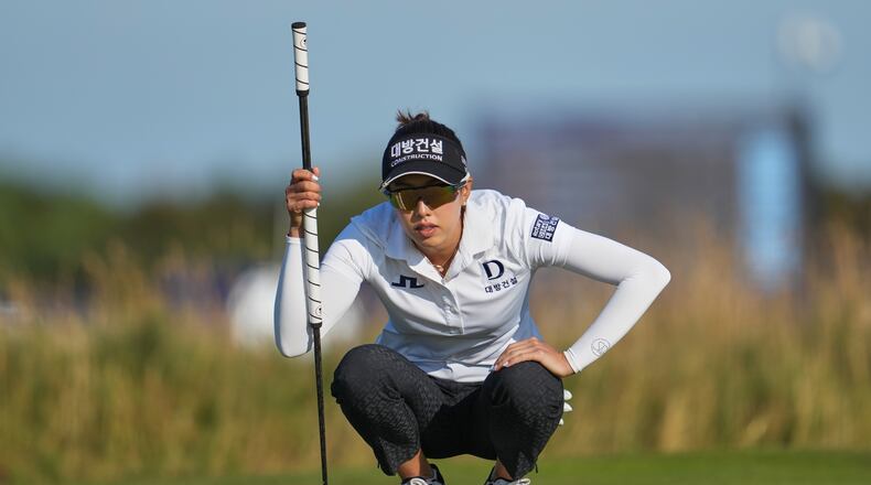 Yealimi Noh, of the Unites States, lines up a putt on the 17th green during the third round of the Women's British Open golf championship in Lytham St Annes, England, Saturday, Aug. 1, 2026. (AP Photo/Jon Super)