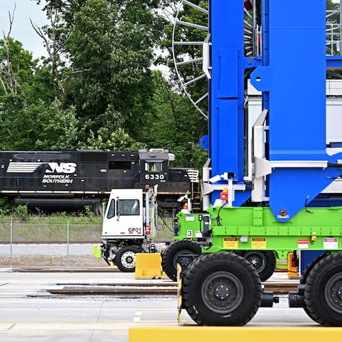A Norfolk Southern train passes a new inland port in Gainesville on Tuesday, May 12, 2026. The inland port connects Savannah's seaport to North Georgia by rail. (Hyosub Shin/AJC)