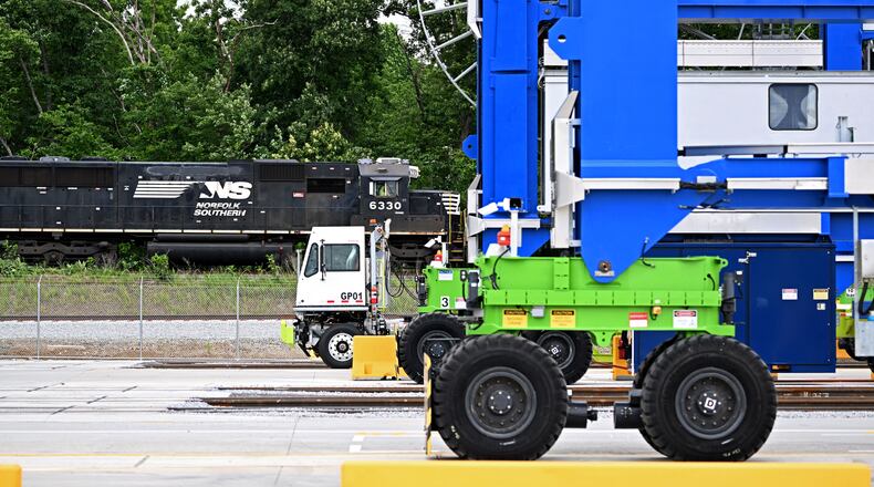 A Norfolk Southern train passes a new inland port in Gainesville on Tuesday, May 12, 2026. The inland port connects Savannah's seaport to North Georgia by rail. (Hyosub Shin/AJC)