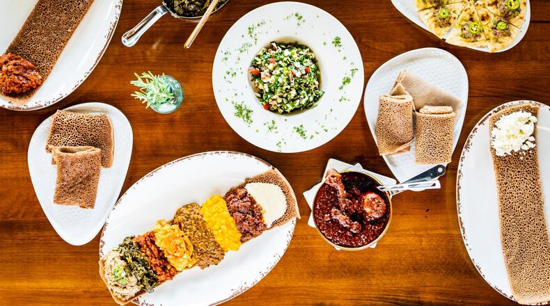 A selection of food at Feedel Bistro, an Ethiopian and Eritrean restaurant on Briarcliff Road. CONTRIBUTED BY HENRI HOLLIS