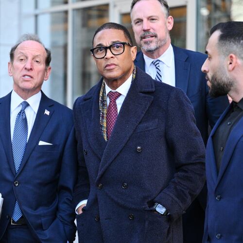 FILE - Journalist Don Lemon, center, exits the U.S. District Courthouse in St. Paul, Minn., Feb. 13, 2026. (AP Photo/Tom Baker, File)