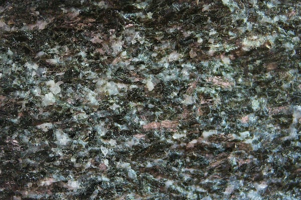 This photo provided by researcher Jonathan O'Neil shows a closeup of a rock from Canada's Nuvvuagittuq Greenstone Belt dated to about 4.16 billion years old. (Jonathan O'Neil via AP)