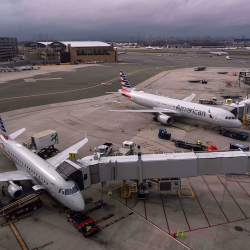 American Eagle and American Airlines planes sit at gates at LaGuardia Airport (LGA), in the Queens borough of New York, Sunday, Nov. 9, 2025. (AP Photo/Adam Gray)