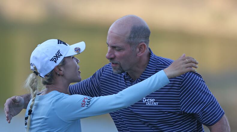 Lydia Ko of New Zealand hugs former MLB pitcher John Smoltz on the 18th hole after the third round of the Diamond Resorts Tournament of Champions at Tranquilo Golf Course at Four Seasons Golf and Sports Club Orlando on January 19, 2019 in Lake Buena Vista, Florida. (Photo by Matt Sullivan/Getty Images)