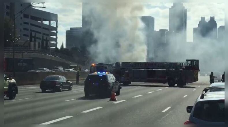 Authorities responded to a car fire that temporarily blocked several southbound lanes of the Downtown Connector.