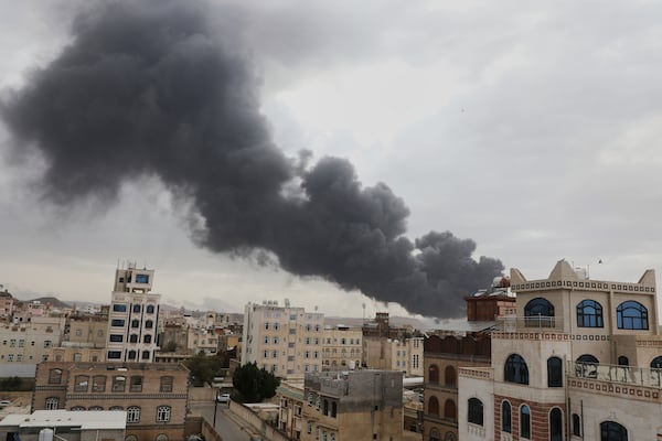 Smoke billows following Israeli airstrikes targeting a power plant and Sanaa Airport, in Sanaa, Yemen, Tuesday, May 5, 2025. (AP Photo/Osamah Abdulrahman)