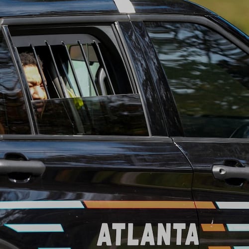 Derrick Groves, the last escapee from the New Orleans jailbreak in May, was taken into custody by U.S. marshals and Atlanta police at a southwest Atlanta home Wednesday. (Ben Hendren for the AJC)