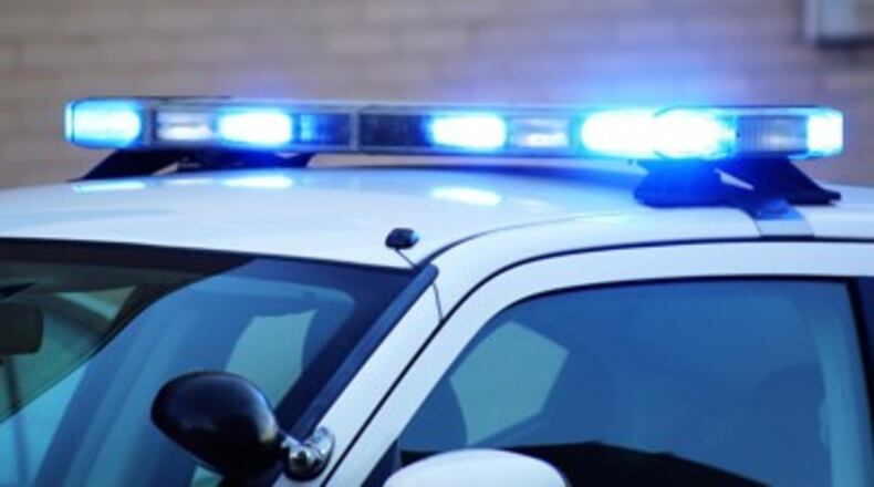 Police say the four suspects entered the Shell gas station on State Bridge Road by shattering a glass door. A witness said they were "young men" dressed in all black.