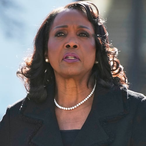 FILE - Federal Reserve Board of Governors member Lisa Cook leaves the Supreme Court in Washington, Jan. 21, 2026. (AP Photo/Mark Schiefelbein, File)