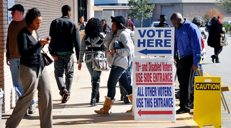 LEDE November 1, 2012 DECATUR A steady stream of early voters is seen at the Dekalb Voter Registrations and Elections offices on Memorial Drive in Decatur Thursday November 1, 2012. White voters continue to lose clout in Georgia. For the first time in state history, they make up less than 60 percent of registered voters expected to participate in this year's presidential election, according to new numbers from the Secretary of State's office. Among "active" registered voters, blacks remained steady at about 30 percent. The biggest difference, however, came from a growing pool of voters who declined to identify themselves by race or ethnicity. One caution: These numbers excluded some registered voters because of inactivity, although they remain eligible to vote in Georgia. KENT D. JOHNSON / AJC An early voting site in Decatur in 2012 (AJC/Kent Johnson)