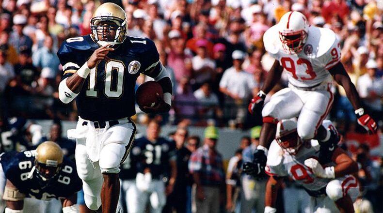 Shawn Jones was a member of the AJC Super 11 team in 1987 and later led the Georgia Tech Yellow Jackets to the 1991 Florida Citrus Bowl championship over Nebraska, earning a share of the national championship. (AJC file photo by Marlene Karas)